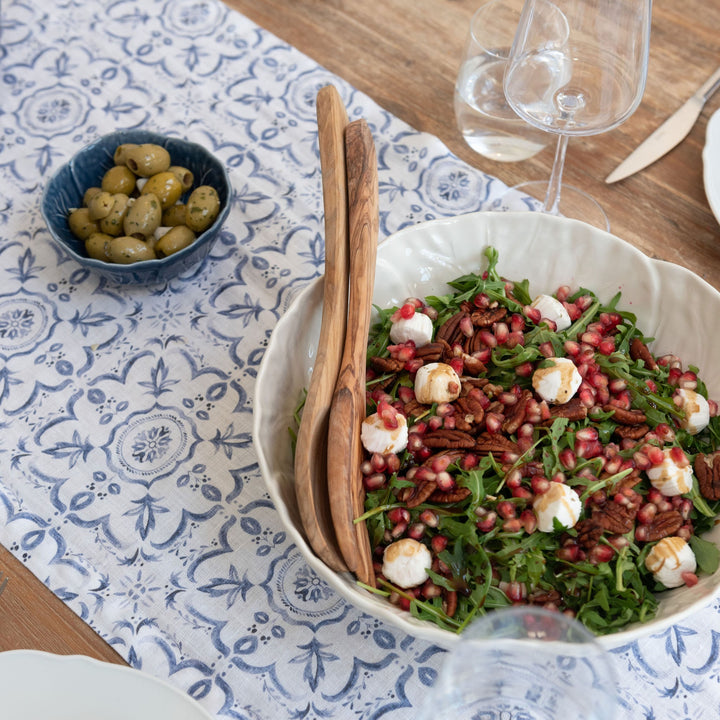 Blue and white table runner with salad bowl